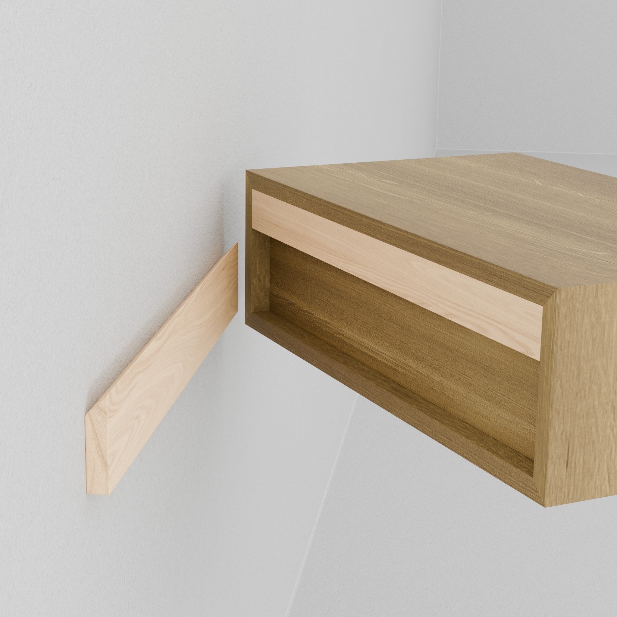 A person in rolled-up white sleeves installs the Krovel Hardwood Floating Nightstand Shelf onto a wooden wall bracket mounted on a light-colored wall.