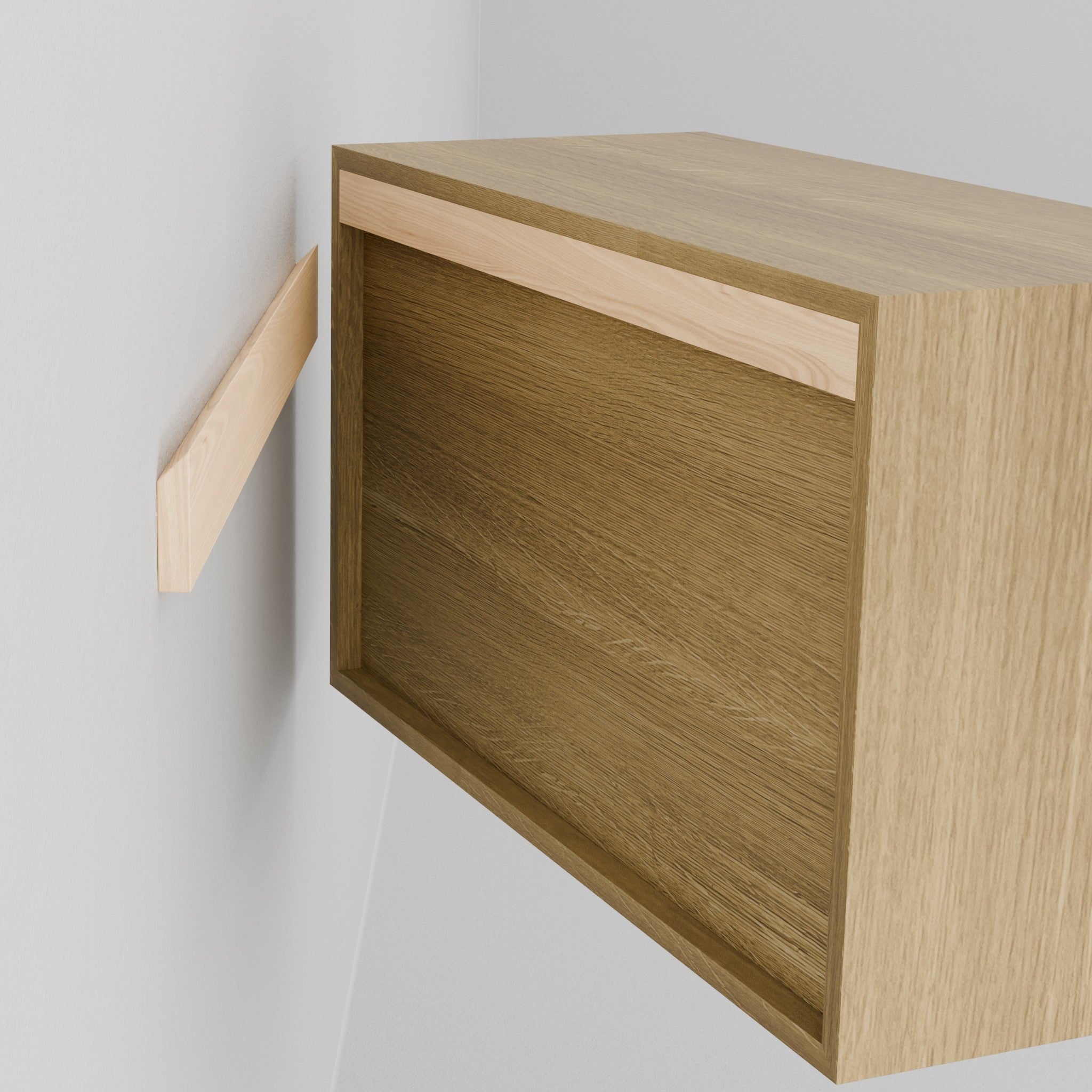 A person holds the Krovel Hardwood Floating Dresser, aligning its recessed back with a wall-mounted bracket to hang it securely using the included French cleat system.