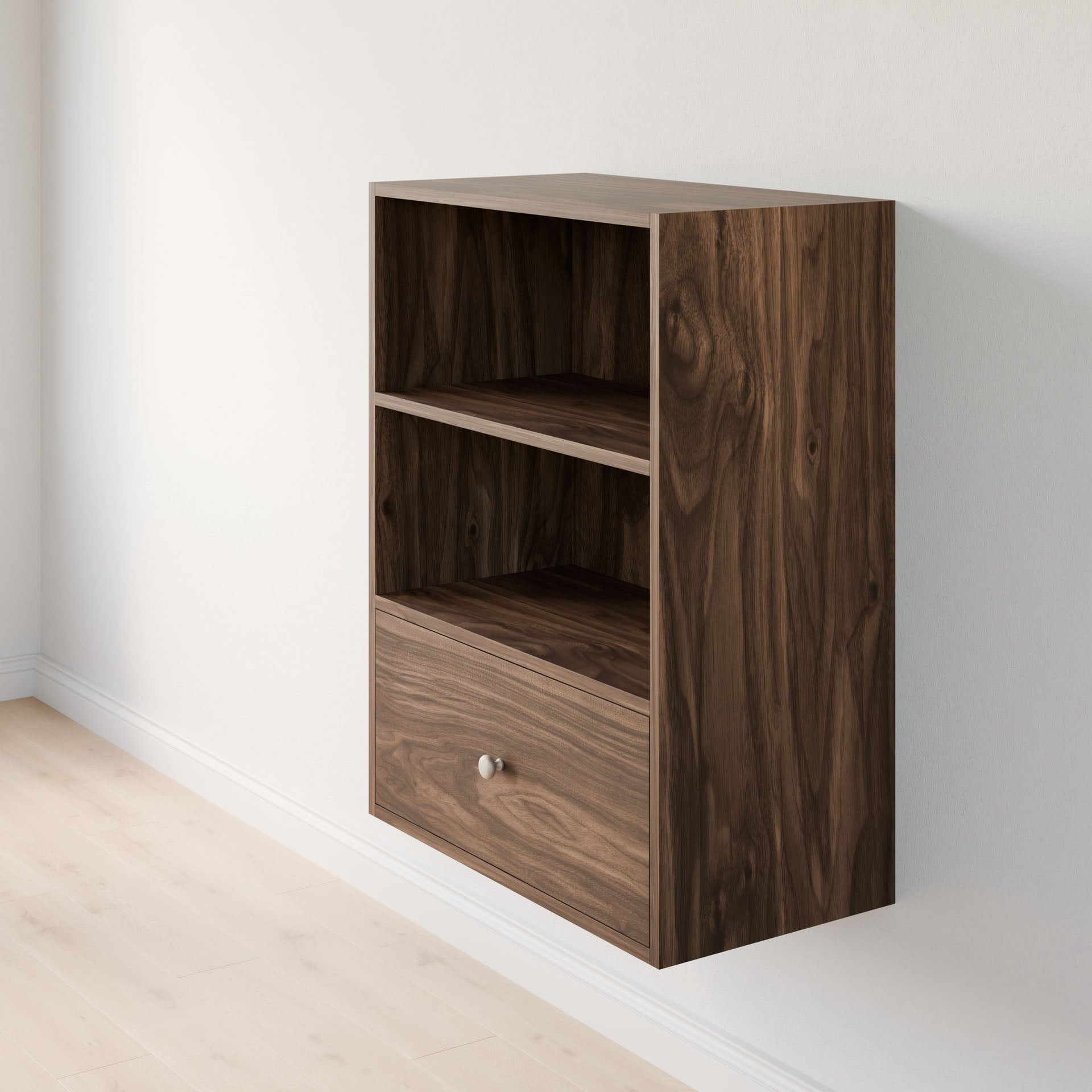 The Maine Made Closet Drawers by Krovel Furniture Co. is a compact, wall-mounted unit crafted from premium cabinet plywood with a natural finish. It offers two open shelves and a drawer with a round metal knob, ideal for organizing closets.