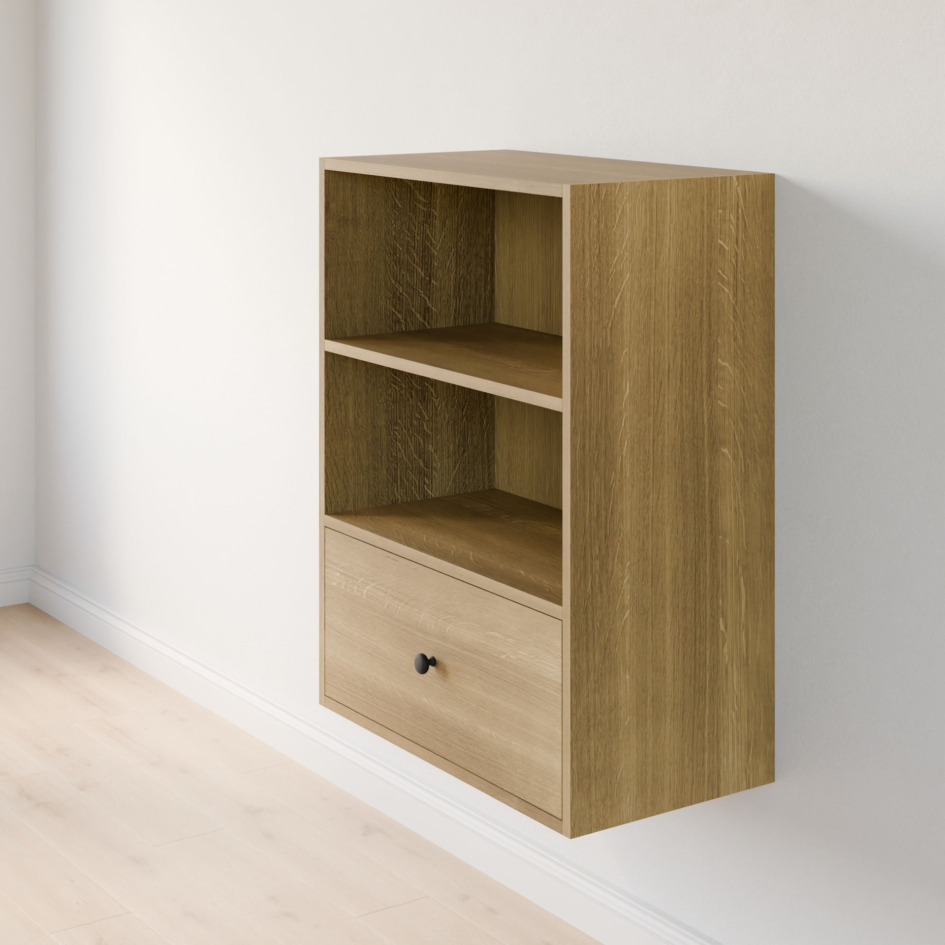 The Maine Made Closet Drawers by Krovel Furniture Co. feature a wooden modular design with two open shelves and a bottom drawer, crafted from premium cabinet plywood, shown against a light-colored wall and floor.