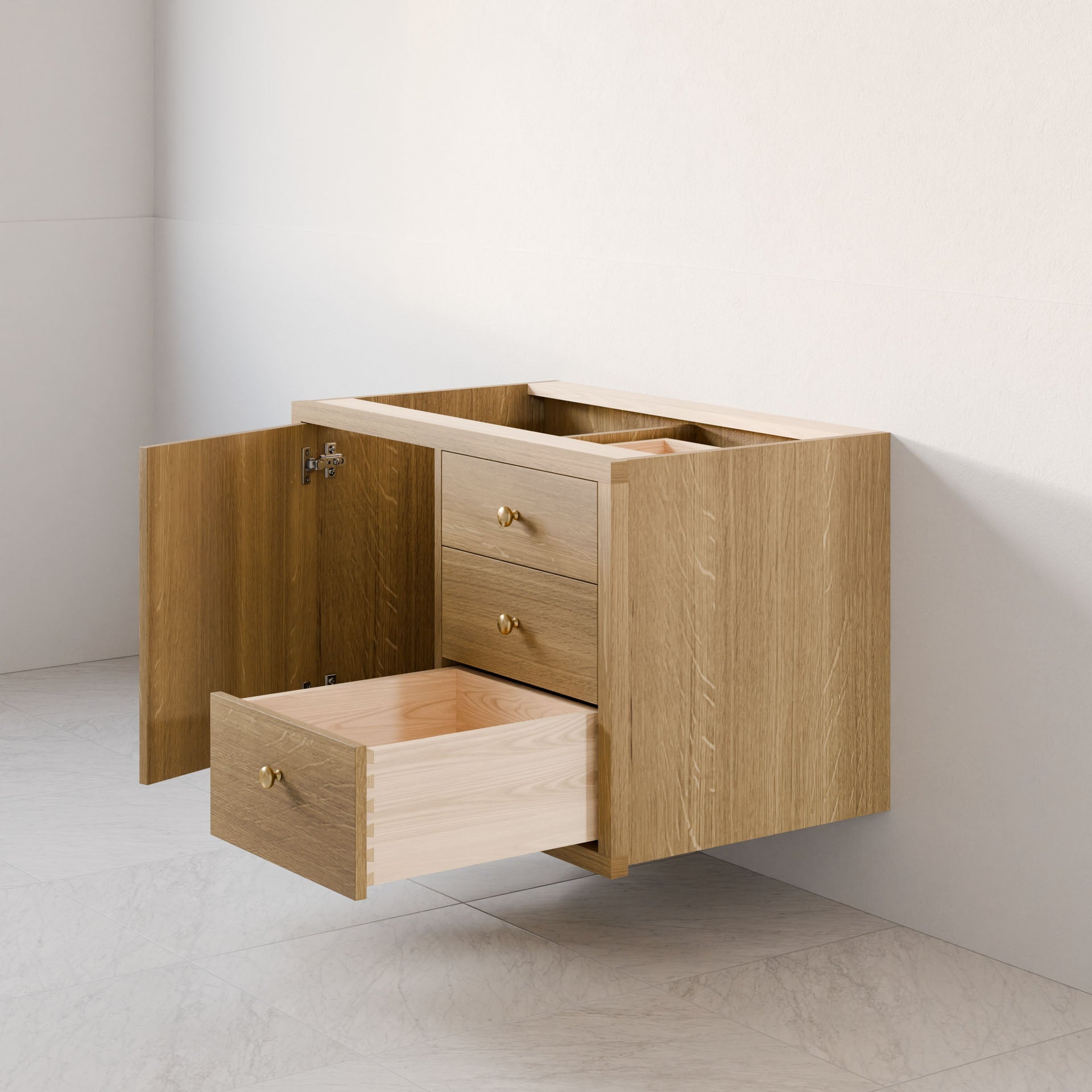 The Maine Made Single Door, Triple Drawer Vanity by Krovel Furniture Co. features a floating hardwood design with three drawers and a side cabinet door, mounted against a white wall over light-colored tiled flooring.