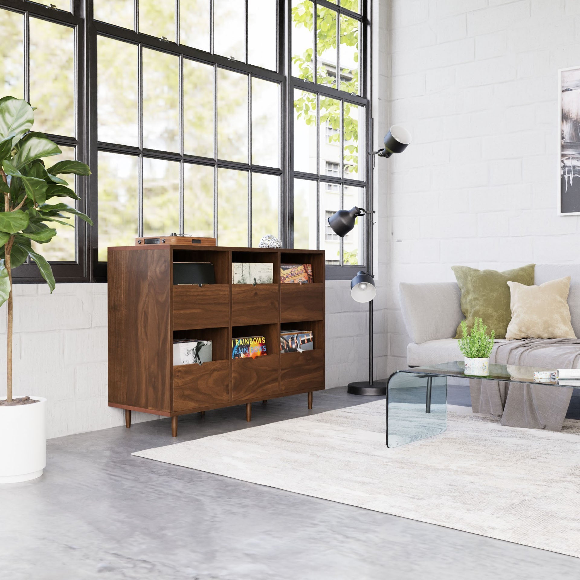 A hardwood walnut record credenza featuring eight drawers, filled with vinyl records