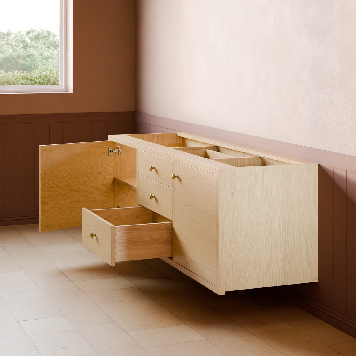 A light natural wood wall-mounted vanity cabinet with multiple drawers and open storage compartments, shown installed against a beige wall with brown wainscoting in an interior room. One drawer is open, and the cabinet door on the left is partially open.