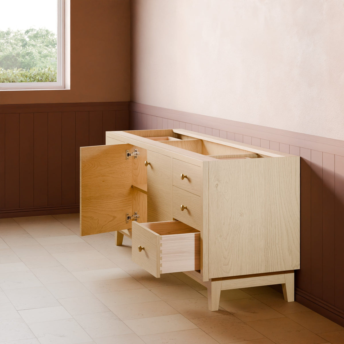A light natural wood sideboard cabinet with brass handles, shown in a room setting with its doors and drawers open. The cabinet is positioned against a wall with brown wainscoting and a beige upper wall.