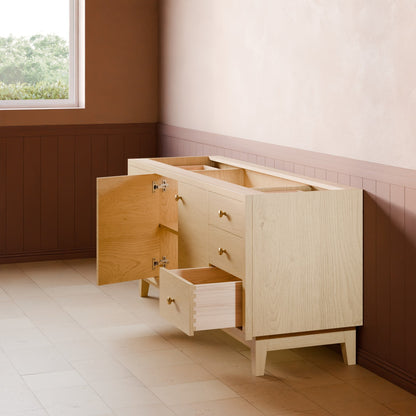 A light natural wood sideboard cabinet with brass handles, shown in a room setting with its doors and drawers open. The cabinet is positioned against a wall with brown wainscoting and a beige upper wall.