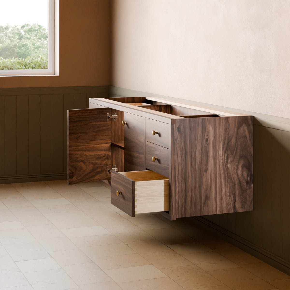 A floating wall-mounted wooden vanity cabinet with dark walnut grain, brass handles, and an open lower drawer, shown installed against a beige wall in a room with wood paneling and tiled floor.