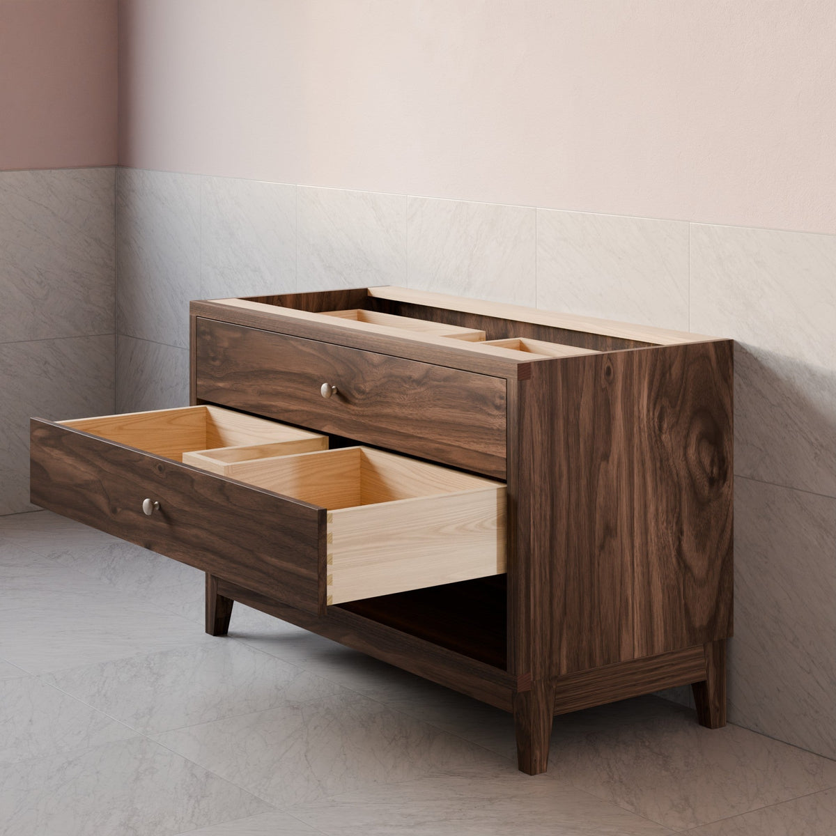 A dark walnut wood storage cabinet with two open drawers showing light wood interiors, set against a minimalist beige and gray tiled wall.