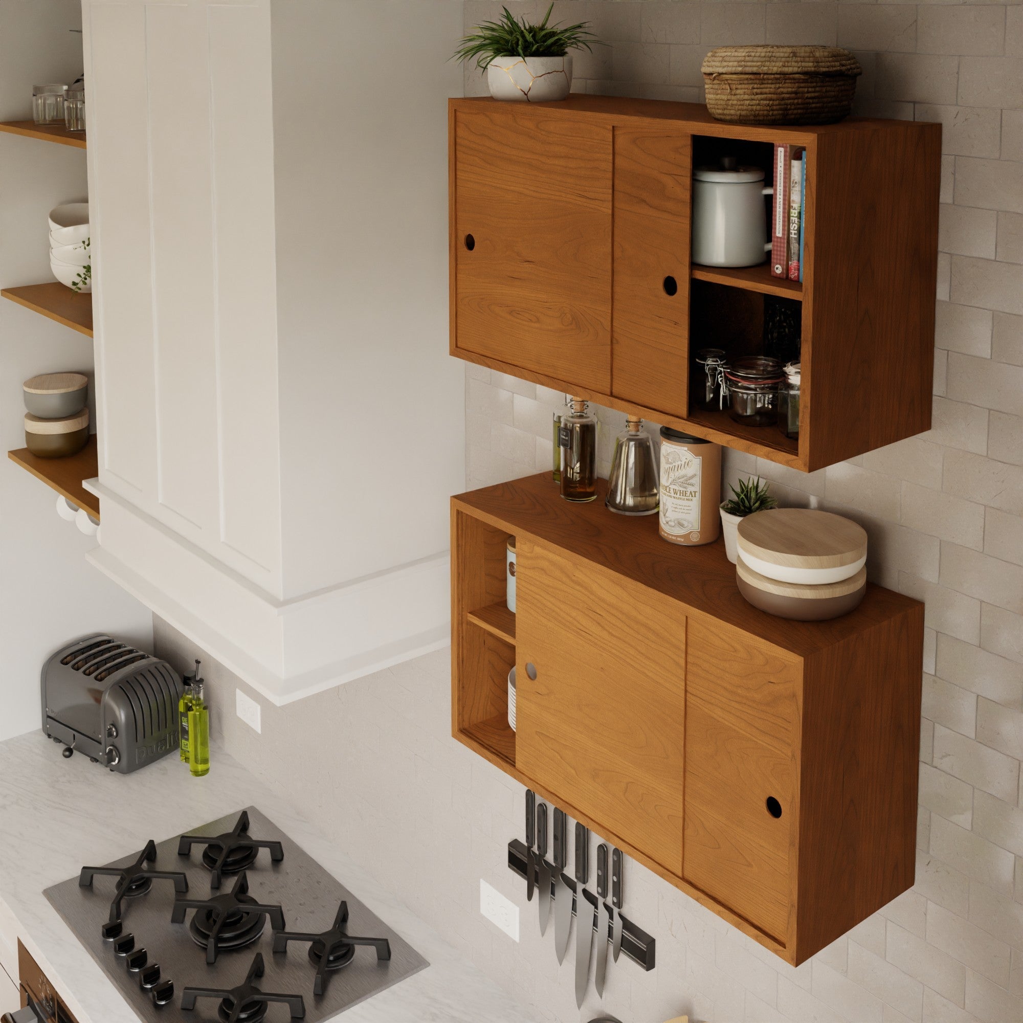 The Krovel Hardwood Cupboard Shelf is wall-mounted above a tiled counter with a gas stove, knife rack, toaster, and essentials. Sliding doors conceal storage, while potted plants and dishes decorate the shelf for added style.