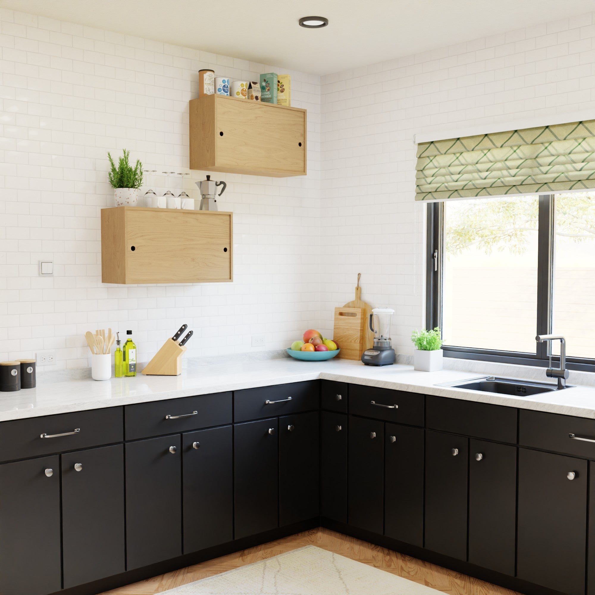 Modern kitchen featuring Krovel hardwood cupboard shelves, black lower cabinets, and white countertops. A window with a patterned blind lets in sunlight. Kitchen items, a blender, and a fruit bowl sit on the countertop.