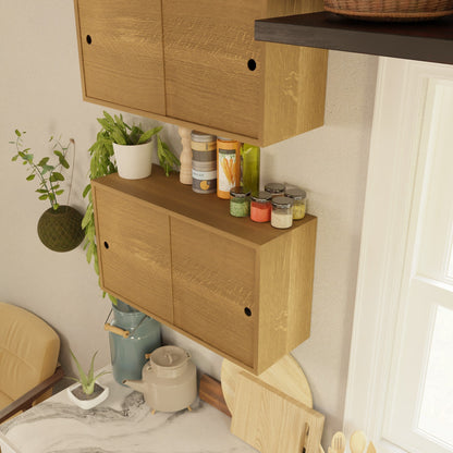 The Krovel Hardwood Cupboard Shelf is wall-mounted above a marble countertop, with jars of spices, plants, a teapot, cutting boards, and kitchen utensils arranged neatly below.