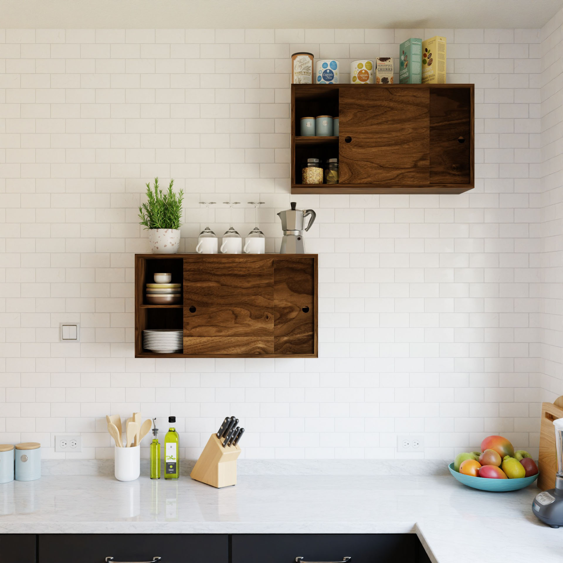 A modern kitchen with white subway tiles and dark hardwood cabinets. There are two wall-mounted cabinets displaying kitchen items. A countertop features a handmade knife block, bottles, and a bowl of fruits. Natural light brightens the scene, highlighting the craftsmanship made in the USA.