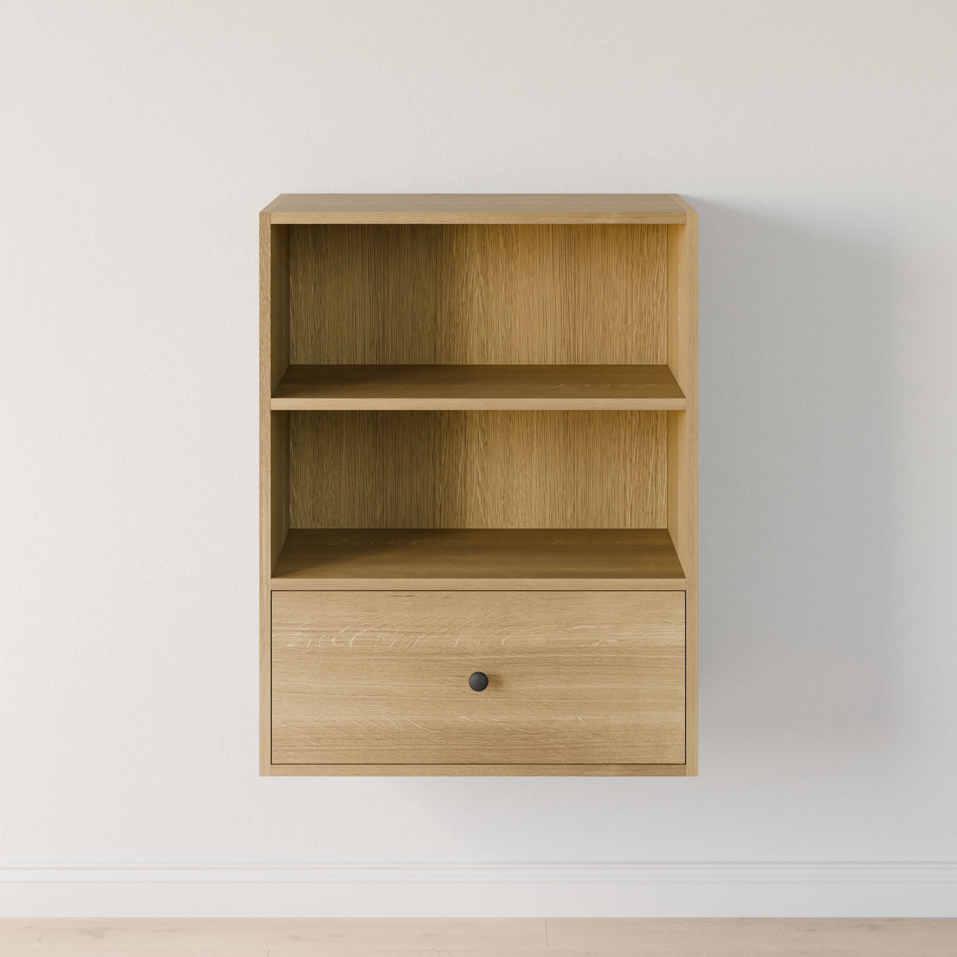 The Maine Made Closet Drawers by Krovel Furniture Co. is a light wood wall-mounted shelf with two open compartments and a single drawer, crafted from premium cabinet plywood for durability—ideal for closet organization against white walls.