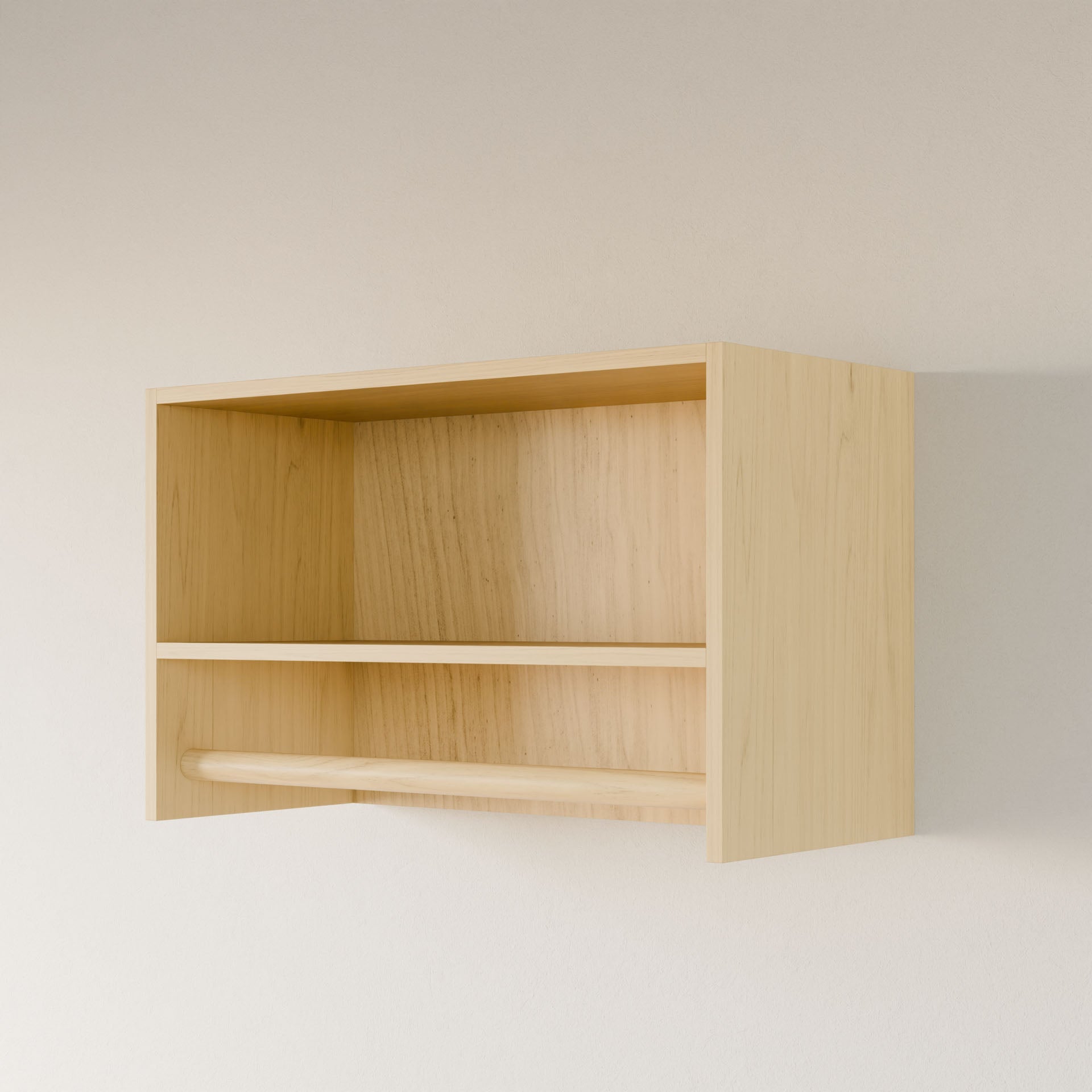 The Closet Hanger with Shelf in Maple by Krovel Furniture Co. is handcrafted in Portland, Maine with premium cabinet-grade plywood. It features a larger upper section, a lower wooden rod against a white wall, and a light natural finish that blends style and functionality seamlessly.