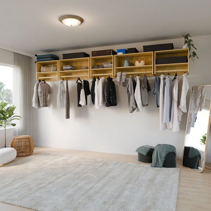 A modern bedroom closet features open wooden shelves, decor boxes, a large mirror, a plant, two ottomans, a beige rug on light wood floors, and the Maine Made Closet Hanger with Shelf by Krovel Furniture Co. for organized clothing storage.