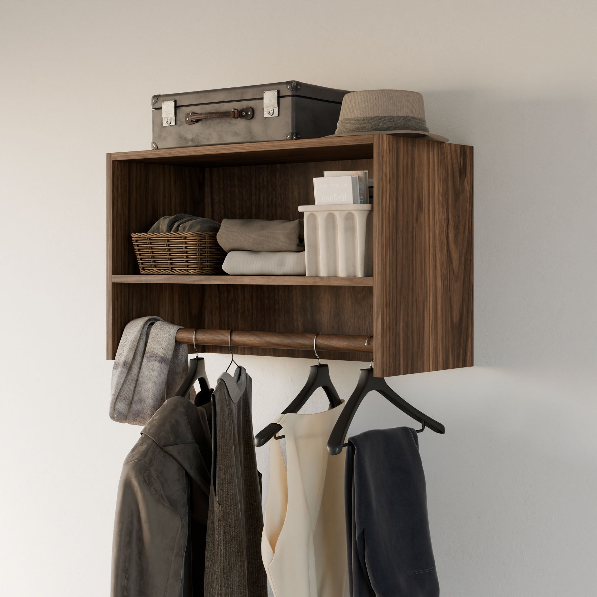 The Krovel Furniture Co. Maine Made Closet Hanger with Shelf is a premium plywood, wall-mounted organizer from Portland, Maine, with compartments for a suitcase, hat, baskets, and a modular hanger for coats and clothing.