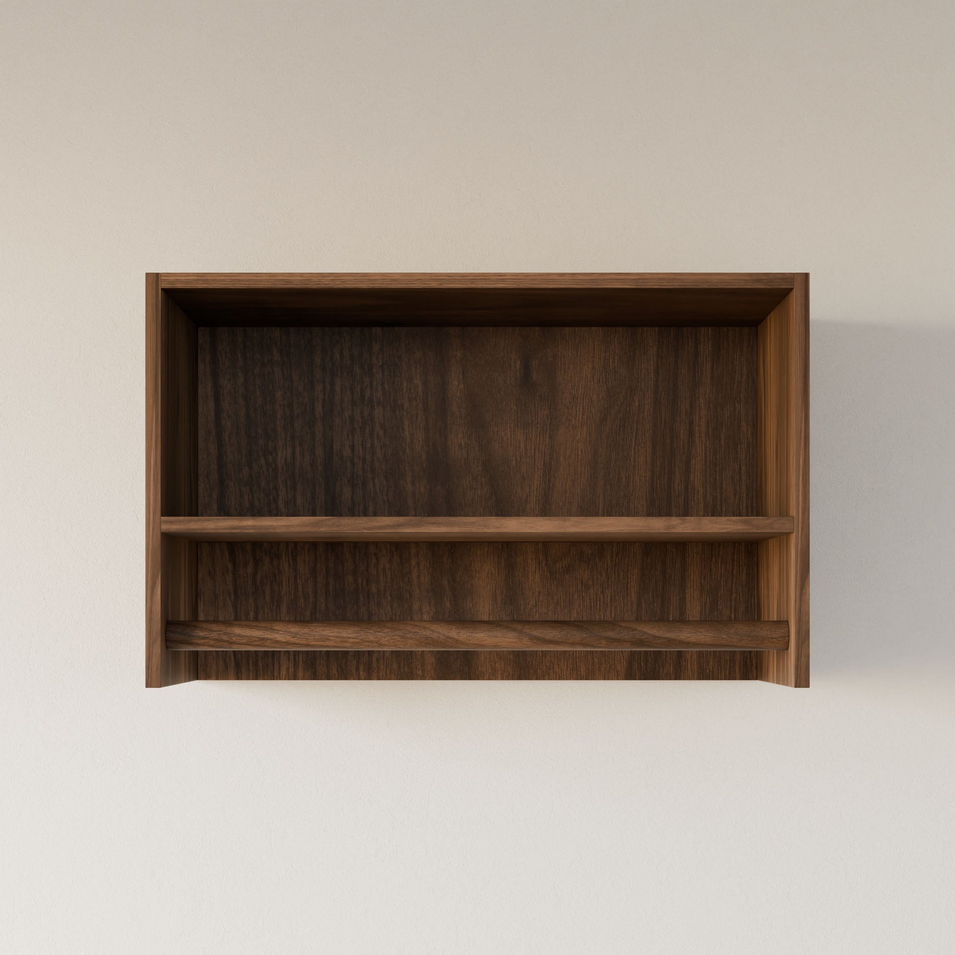 The Maine Made Closet Hanger with Shelf by Krovel Furniture Co. is a wall-mounted unit crafted from premium cabinet plywood in a dark brown finish, handmade in Portland, Maine, featuring a central shelf dividing two storage sections.