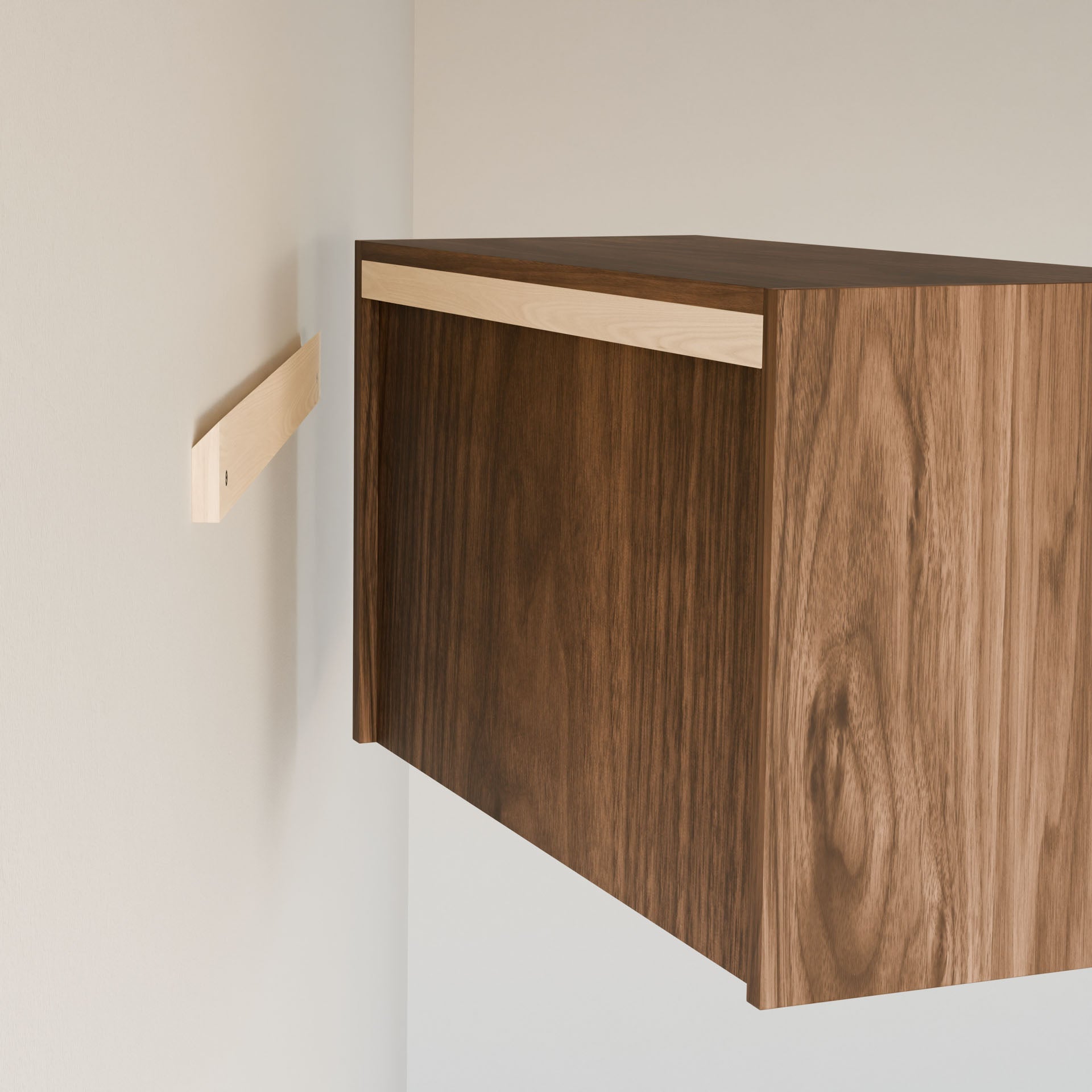 The Maine Made Closet Hanger with Shelf by Krovel Furniture Co. is handcrafted in Portland, Maine from premium cabinet plywood. It mounts easily to light-colored walls with a visible wooden cleat, showcasing its simple wall-mounting design.