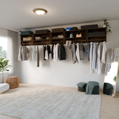 A modern closet organized with the Maine Made Closet Hanger with Shelf by Krovel Furniture Co., premium plywood shelves and cubbies, hanging clothes, storage boxes, a floor mirror, greenery, a soft rug, and sunlight from a large window.
