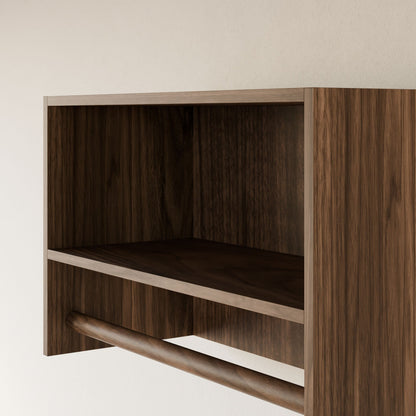 A close-up of the Maine Made Closet Hanger with Shelf by Krovel Furniture Co., handmade in Portland, Maine from premium cabinet plywood, featuring an open compartment and rod beneath, mounted on a light-colored wall.