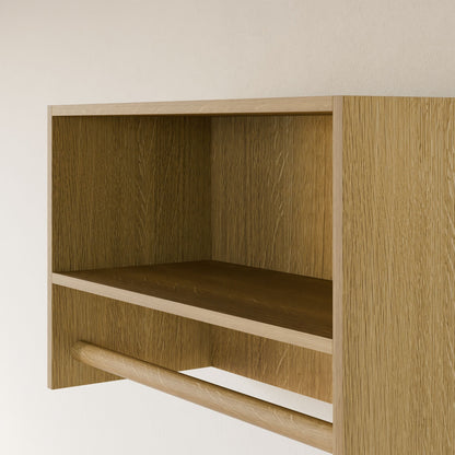 A close-up of the Maine Made Closet Hanger with Shelf by Krovel Furniture Co., handcrafted in Portland, ME from premium cabinet plywood, with an open compartment and horizontal bar mounted on a light-colored wall.