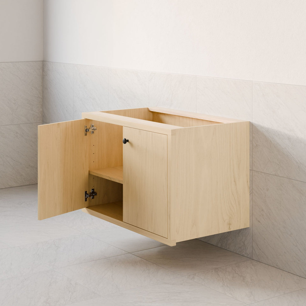 The Double Door Vanity in Maple by Krovel Furniture Co. features two doors, one open to reveal a shelf inside, and is installed against a tiled wall in a minimalist, modern room.