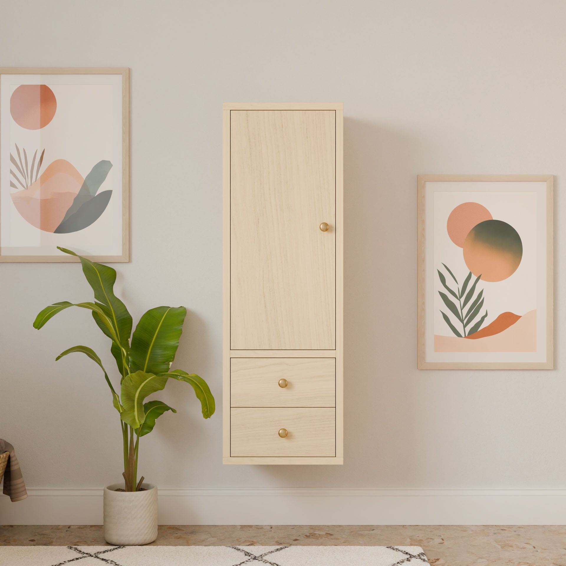 A minimalist room showcases a solid hardwood Double Drawer Linen Cabinet in Maple by Krovel Furniture Co., flanked by abstract artwork. Below, a green potted plant complements the neutral decor, reflecting sustainable construction values.
