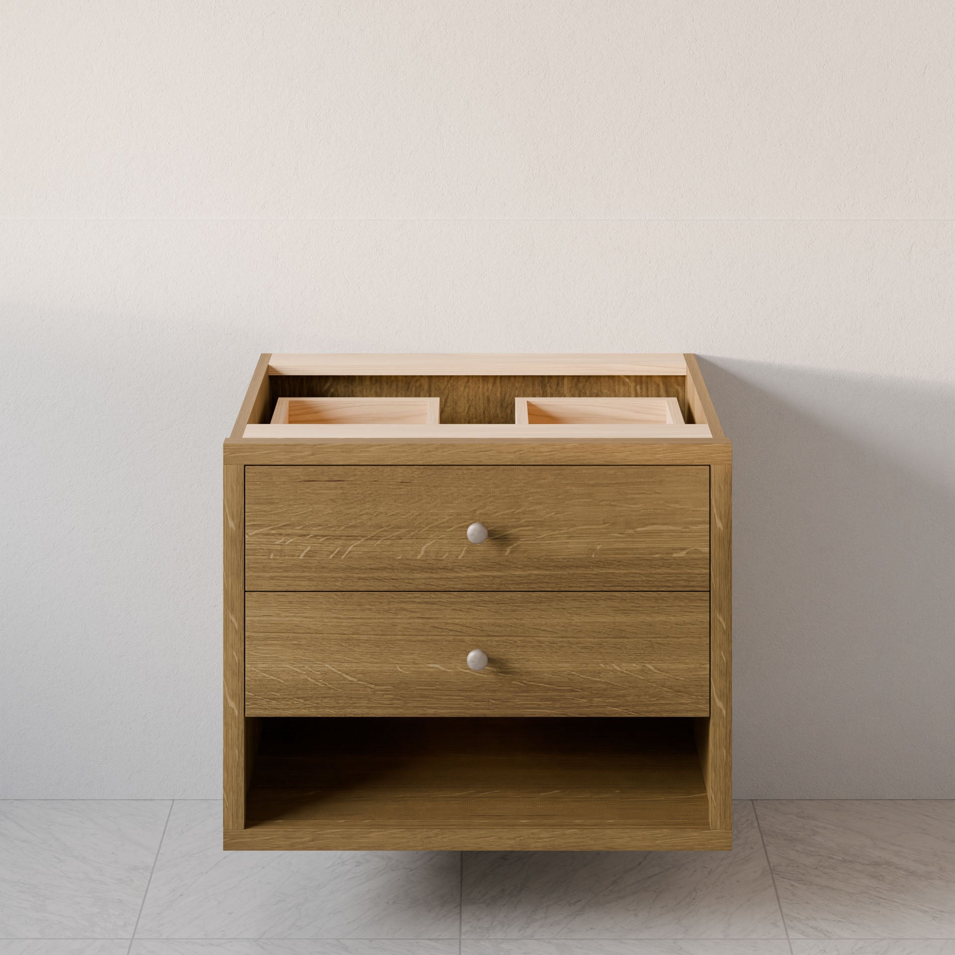 The Maine Made Double Drawer, Open Shelf Vanity by Krovel Furniture Co. features two drawers and an open shelf, shown without a countertop or sink, and brings functional style to any bathroom space.