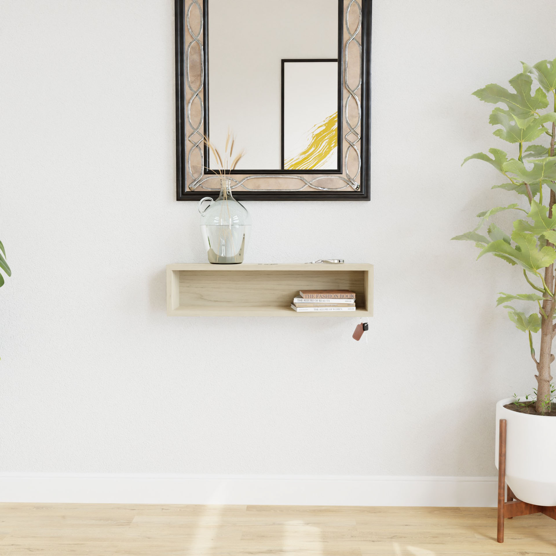 A minimalist interior showcases a Krovel Maple Entryway Organizer beneath a decorative mirror, secured with a french-cleat system. The organizer holds a glass vase and books. A tall potted plant is on the right, and light wood flooring complements the serene ambiance.
