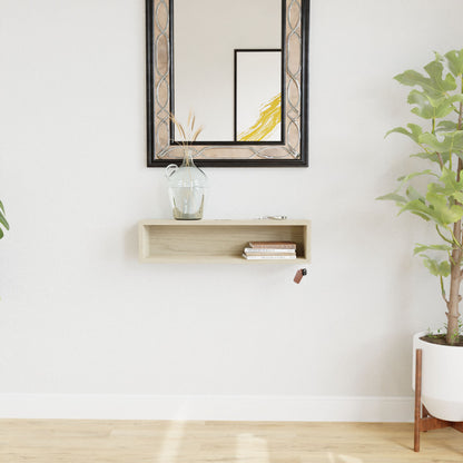 A minimalist entryway showcases the Krovel Hardwood Entryway Organizer displaying a vase, books, and keys, with a large decorative mirror above and a tall potted plant on a wooden stand to the right.