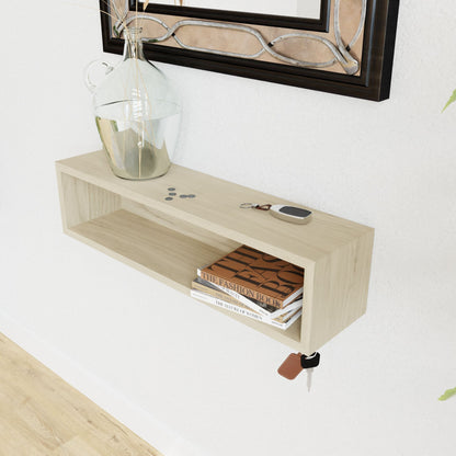 The Krovel Hardwood Entryway Organizer is a handmade hardwood shelf with a glass vase, coins, and key fob on top, books stored inside, and keys hanging from a hook below—mounted on a white wall.