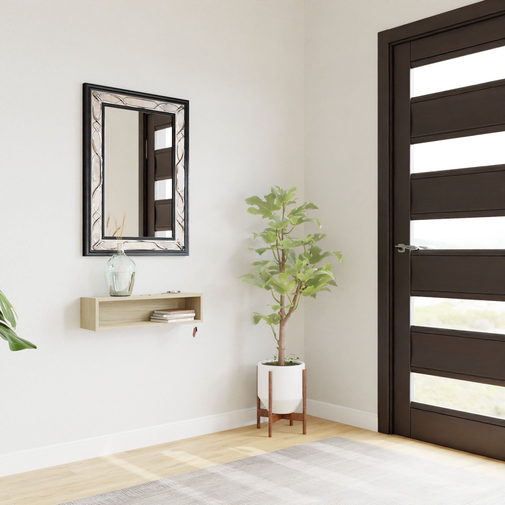 A modern, minimalistic entryway showcases a large dark American White Oak door, a wall-mounted mirror, and Krovel's floating Entryway Organizer in Maple adorned with a vase and decor. A broad-leafed potted plant adds charm on the floor while bright natural light floods the space.