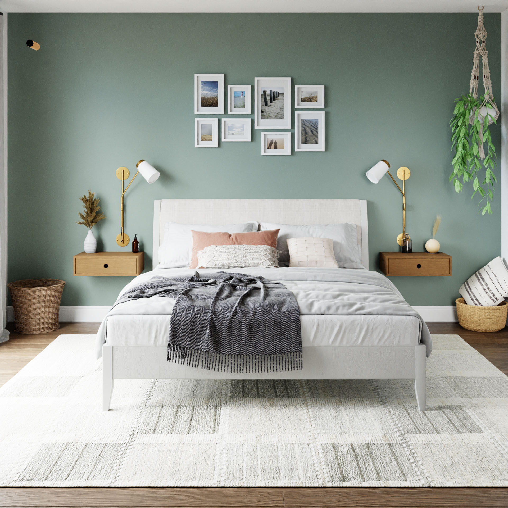 In a contemporary bedroom, a neatly made bed showcases gray and pink pillows alongside a gray blanket. The backdrop displays a green wall embellished with framed artwork. Two Krovel Floating Nightstands in solid American White Oak, wall lamps, and a hanging plant enhance the decor, while a white textured rug adds warmth to the floor. 