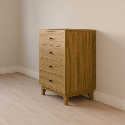 The Maine Made Four Drawer Dresser by Krovel Furniture Co. features four drawers with black knobs and stands on a light wood floor against a light wall in a minimalist room, handcrafted in Portland, Maine.