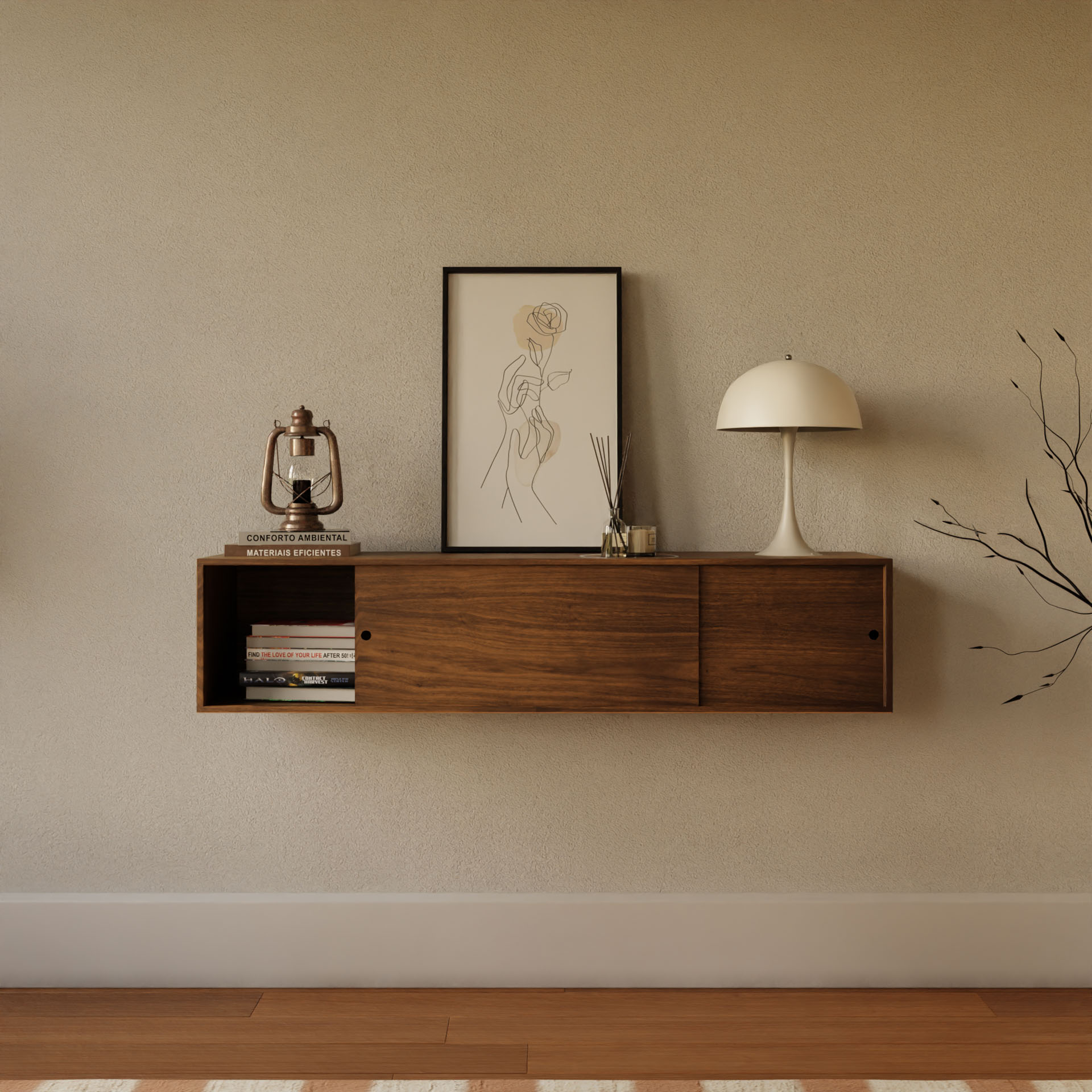 A minimalist interior showcases a hand-finished wooden wall shelf with books and a vintage lantern. A framed line drawing of a flower sits next to a modern white lamp, while a leafless branch complements the neutral-toned wall and American Cherry wood flooring beneath Krovel's Oversized Media Console Table in Walnut.