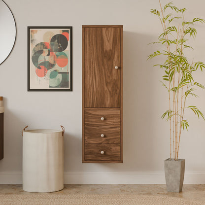 A stylish room features the Krovel Furniture Co.s Triple Drawer Linen Cabinet in Walnut, adorned with abstract art. A cylindrical laundry basket and a potted bamboo plant enhance the sustainable ambiance.