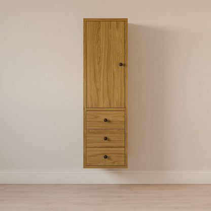 The Maine Made Triple Drawer Linen Cabinet by Krovel Furniture Co., crafted from solid hardwood, features three drawers and one door—a stylish wall-mounted addition to any bathroom vanity cabinets ensemble.